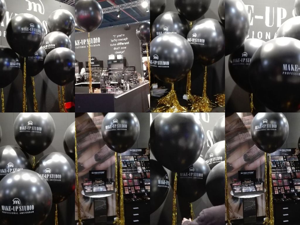 reuze ballonnen bedrukt Jaarbeurs Utrecht met gouden slingers