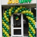 ballonnenboog maken subway  groen met gele ballonnen openingen nieuw restaurant
